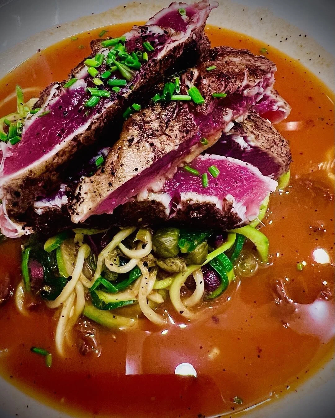 Seared tuna over zucchini noodles